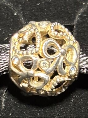 Chamilia Openwork Bows and Hearts charm with clear Swarovski crystals. 925